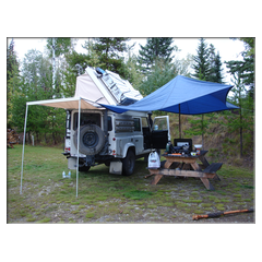 Unser Camper, mit Tarp gegen den Regen